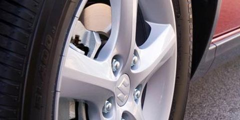 Tire, Wheel, Alloy wheel, Automotive tire, Automotive wheel system, Rim, Spoke, Automotive design, Synthetic rubber, Tread, 
