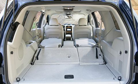 Vehicle, Car, Trunk, Car seat, Vehicle door, Car seat cover, Luxury vehicle, Family car, Head restraint, Sport utility vehicle, 