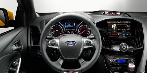 Motor vehicle, Automotive design, Steering wheel, Product, Steering part, Transport, White, Technology, Electronic device, Center console, 