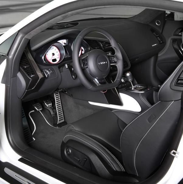 Motor vehicle, Mode of transport, Automotive design, Steering part, Steering wheel, Supercar, Personal luxury car, Center console, Luxury vehicle, Speedometer, 