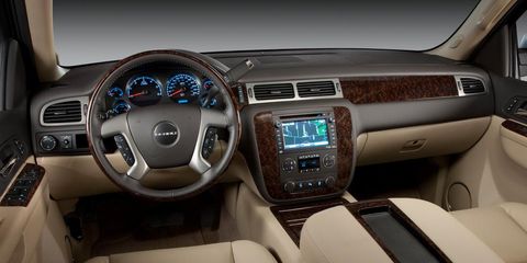 Motor vehicle, Product, Steering part, Brown, Automotive design, Transport, Steering wheel, Vehicle audio, Center console, Car, 