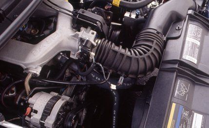 Engine, Automotive fuel system, Automotive engine part, Nut, Pipe, Fuel line, Automotive air manifold, Automotive super charger part, Kit car, Carbon, 