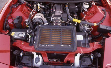 Engine, Red, Automotive engine part, Nut, Fuel line, Automotive super charger part, Automotive air manifold, Machine, Automotive fuel system, Kit car, 