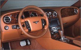 Mode of transport, Steering part, Transport, Steering wheel, Photograph, Vehicle audio, Center console, Bentley arnage, Luxury vehicle, Gear shift, 