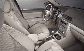 Motor vehicle, Mode of transport, Steering part, Vehicle, Steering wheel, Car seat, Car, Vehicle door, White, Center console, 