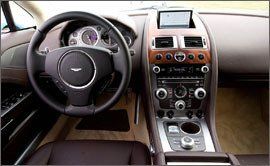 Motor vehicle, Mode of transport, Steering part, Product, Brown, Transport, Steering wheel, Center console, Automotive design, Vehicle audio, 