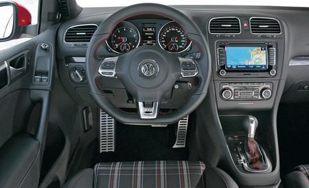 Motor vehicle, Steering part, Mode of transport, Automotive design, Product, Steering wheel, Transport, Center console, Red, White, 