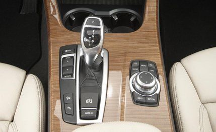 Electronic device, Luxury vehicle, Gear shift, Peripheral, Gadget, Center console, Trunk, Car seat, Carbon, 