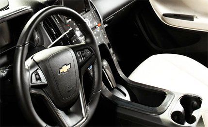 Motor vehicle, Mode of transport, Automotive design, Steering wheel, Steering part, White, Luxury vehicle, Personal luxury car, Sedan, Mid-size car, 