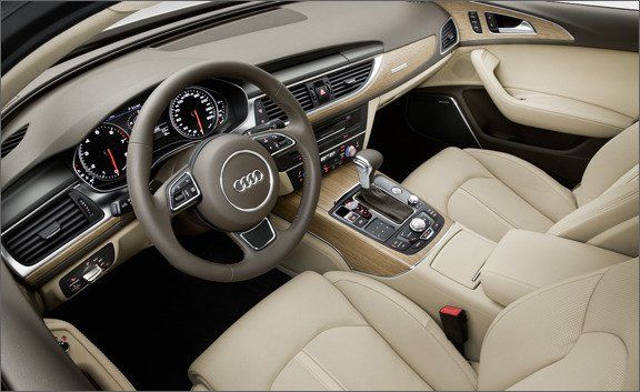 Motor vehicle, Steering part, Brown, Steering wheel, Automotive design, Center console, Vehicle audio, Car seat, White, Automotive mirror, 