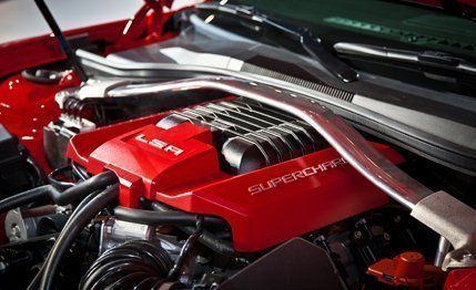Motor vehicle, Automotive design, Red, Engine, Automotive fuel system, Motorcycle accessories, Motorcycle, Maroon, Automotive engine part, Fuel tank, 