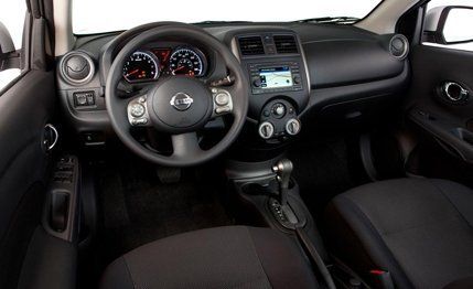 Motor vehicle, Steering part, Mode of transport, Product, Automotive mirror, Automotive design, Brown, Steering wheel, Transport, Center console, 