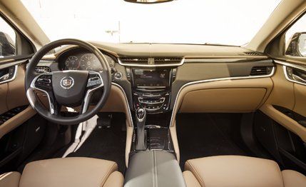 Motor vehicle, Mode of transport, Steering part, Brown, Steering wheel, Center console, White, Car, Vehicle audio, Personal luxury car, 
