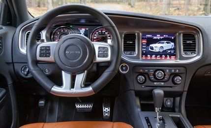 Motor vehicle, Steering part, Mode of transport, Steering wheel, Transport, Automotive design, Vehicle audio, Center console, Speedometer, White, 