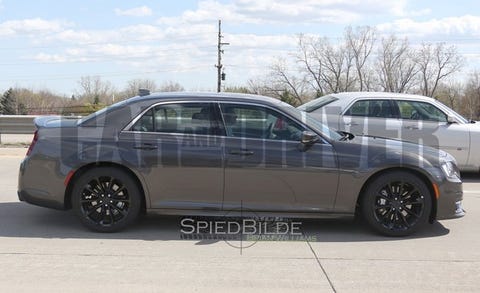 16 Chrysler 300 Srt Spied It S Alive 11 News 11 Car And Driver