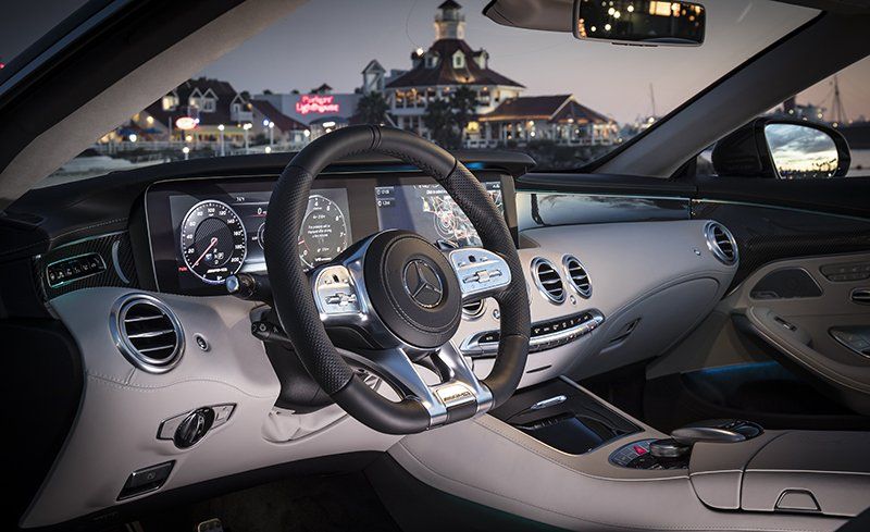 Vehicle, Steering wheel, Luxury vehicle, Car, Steering part, Personal luxury car, Center console, Automotive design, Gear shift, Design, 