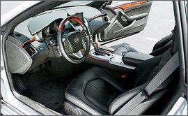 Motor vehicle, Mode of transport, Steering part, Automotive design, Vehicle, Steering wheel, White, Center console, Car, Personal luxury car, 