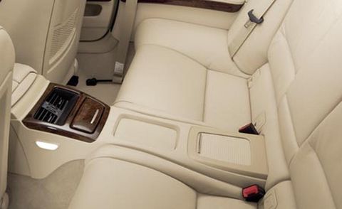 Motor vehicle, White, Car seat, Car seat cover, Head restraint, Beige, Vehicle door, Luxury vehicle, Seat belt, 