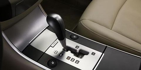 Machine, Car seat, Leather, Silver, Gear shift, Kitchen appliance accessory, Center console, 