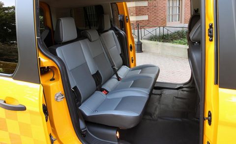 Motor vehicle, Mode of transport, Yellow, Transport, Vehicle door, Fixture, Commercial vehicle, Car seat, Car seat cover, Public transport, 