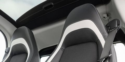 Automotive design, Luxury vehicle, Car seat, Vehicle door, Car seat cover, Carbon, Silver, Leather, Head restraint, Personal luxury car, 