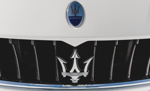 Blue, Transport, Automotive exterior, Grille, Photograph, Symbol, Emblem, Electric blue, Logo, Cobalt blue, 