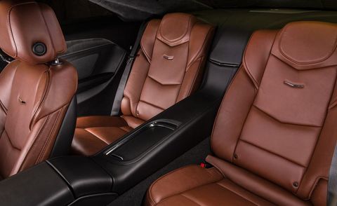 Motor vehicle, Car seat, Car seat cover, Leather, Head restraint, Vehicle door, Luxury vehicle, Tan, Seat belt, Personal luxury car, 