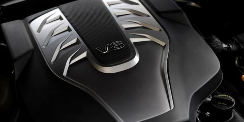 Automotive design, Carbon, Logo, Luxury vehicle, Motorcycle accessories, Personal luxury car, Supercar, Gear shift, Leather, 
