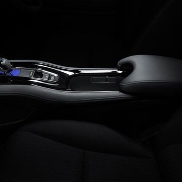 Automotive design, Darkness, Guitar accessory, Still life photography, Guitar, Gear shift, String instrument, Luxury vehicle, Steering part, Center console, 