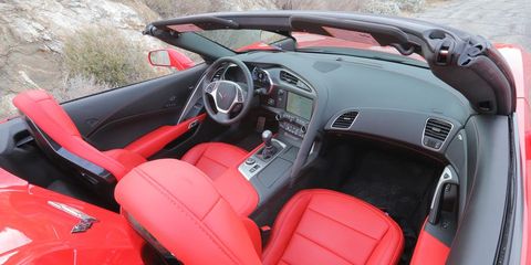 Motor vehicle, Mode of transport, Steering part, Steering wheel, Red, Car seat, Car seat cover, Carmine, Center console, Personal luxury car, 