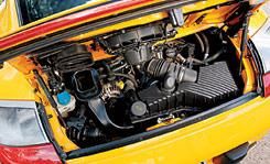 Motor vehicle, Yellow, Engine, Hood, Automotive exterior, Automotive engine part, Orange, Automotive fuel system, Bumper, Fuel line, 