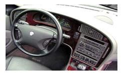 Motor vehicle, Mode of transport, Steering part, Steering wheel, Transport, Vehicle, Photograph, White, Car, Center console, 