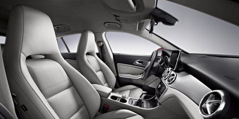 Motor vehicle, Automotive design, Steering part, Steering wheel, White, Car seat, Vehicle door, Center console, Personal luxury car, Luxury vehicle, 