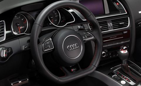 Automotive design, Mode of transport, Steering part, Product, Steering wheel, Vehicle, Car, White, Speedometer, Technology, 