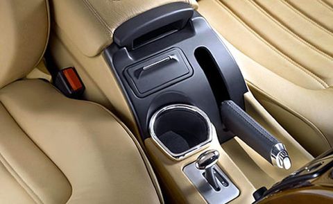 Motor vehicle, Mode of transport, Automotive design, Car seat, Luxury vehicle, Car seat cover, Personal luxury car, Gear shift, Head restraint, Leather, 
