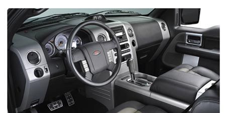 Motor vehicle, Steering part, Product, Steering wheel, White, Center console, Vehicle audio, Luxury vehicle, Technology, Gear shift, 