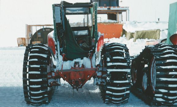 Agricultural machinery, Transport, Winter, Tread, Snow, Automotive tire, Machine, Tractor, Paint, Synthetic rubber, 