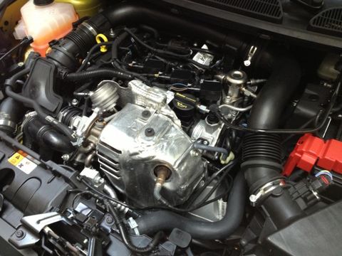 engine bay of a euro market ford fiesta with 10l ecoboost engine