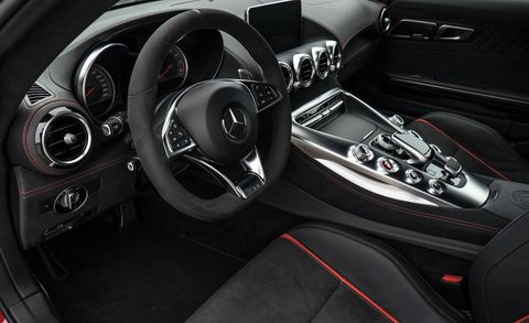 Motor vehicle, Automotive design, Steering part, Steering wheel, Center console, Speedometer, Luxury vehicle, Black, Gear shift, Personal luxury car, 