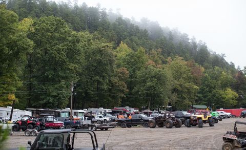 Land vehicle, Automotive exterior, Parking, Automotive carrying rack, Parking lot, Off-road racing, Off-road vehicle, Fog, Temperate broadleaf and mixed forest, Truck, 