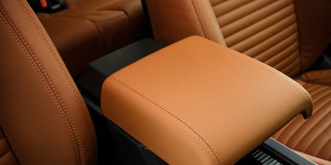 Brown, Tan, Leather, Orange, Car seat, Head restraint, Armrest, Car seat cover, Slipcover, 