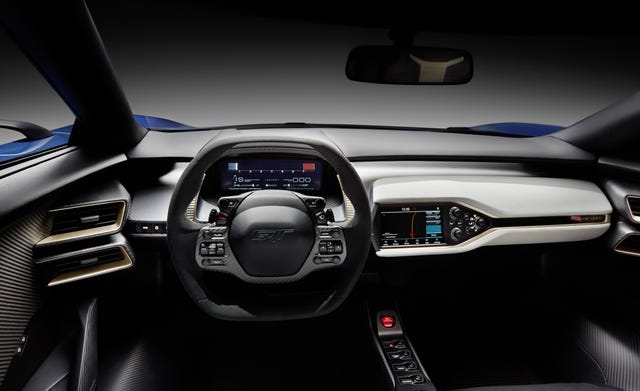 Motor vehicle, Automotive design, Product, Steering wheel, Steering part, Center console, Automotive mirror, Vehicle audio, Technology, Luxury vehicle, 