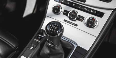 Automotive design, Center console, Steering wheel, Steering part, Luxury vehicle, Gear shift, Personal luxury car, Vehicle audio, Leather, Supercar, 