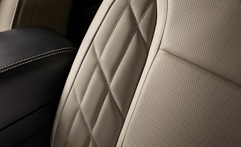Automotive design, Carbon, Car seat, Vehicle door, Leather, Gloss, Silver, Car seat cover, Head restraint, Personal luxury car, 