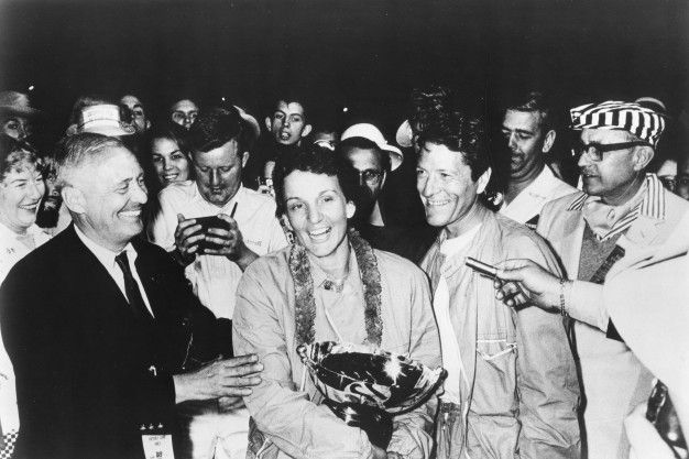 Denise McCluggage accepting Grand Touring Category winner's trophy at Sebring, 1961