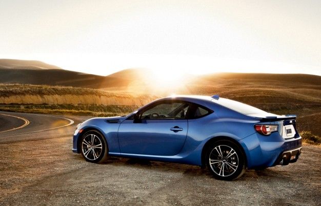 8k wallpaper of a blue subaru brz widebody at sunset on Craiyon