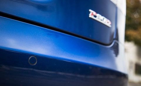 Blue, Automotive design, Automotive exterior, Electric blue, Logo, Azure, Vehicle door, Bumper, Bumper part, Automotive door part, 