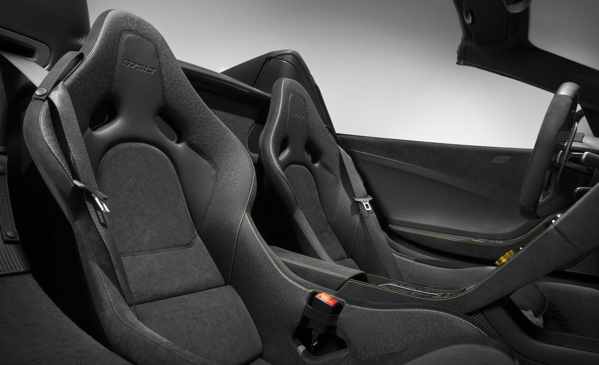 Automotive design, Car seat, Black, Car seat cover, Leather, Design, Seat belt, Vehicle door, Carbon, Luxury vehicle, 