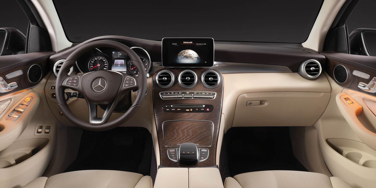 Motor vehicle, Steering part, Brown, Product, Automotive design, Steering wheel, Vehicle audio, Center console, White, Car, 