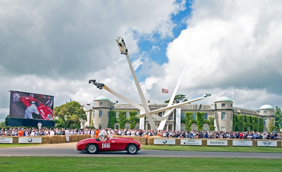 Paddock area at the 2013 Goodwood Festival of Speed, celebrating